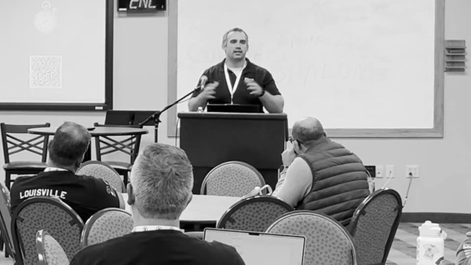 Brad at a podium during AI and Your ChMS: Safe Usage, CITN 2026.